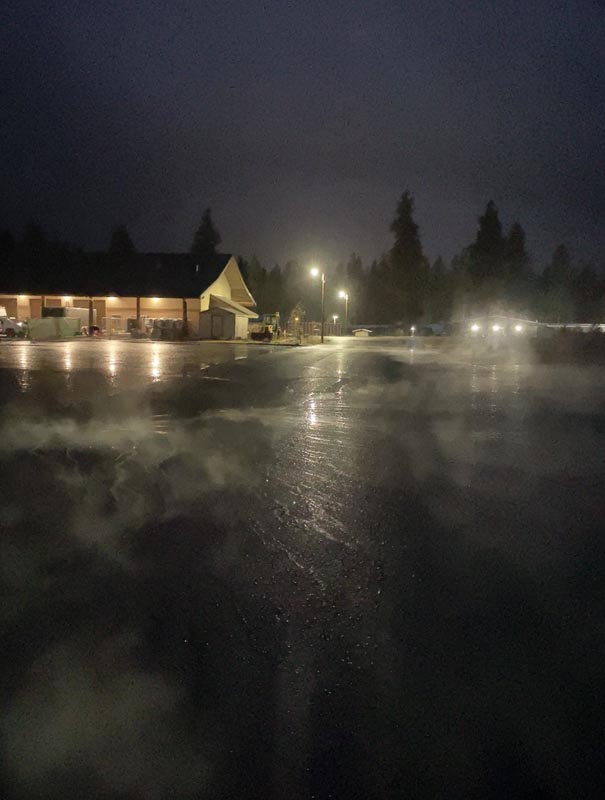 Fresh asphalt during nighttime project work