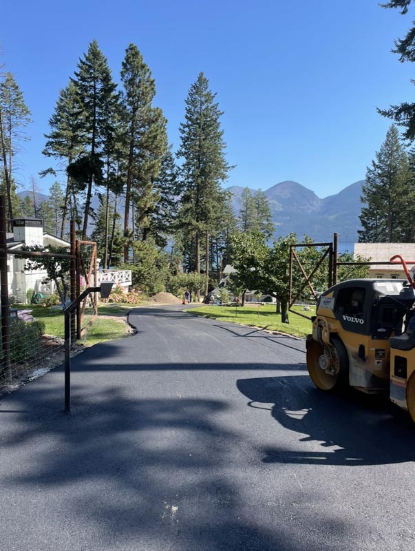 New asphalt road through a Montana mountain neighborhood